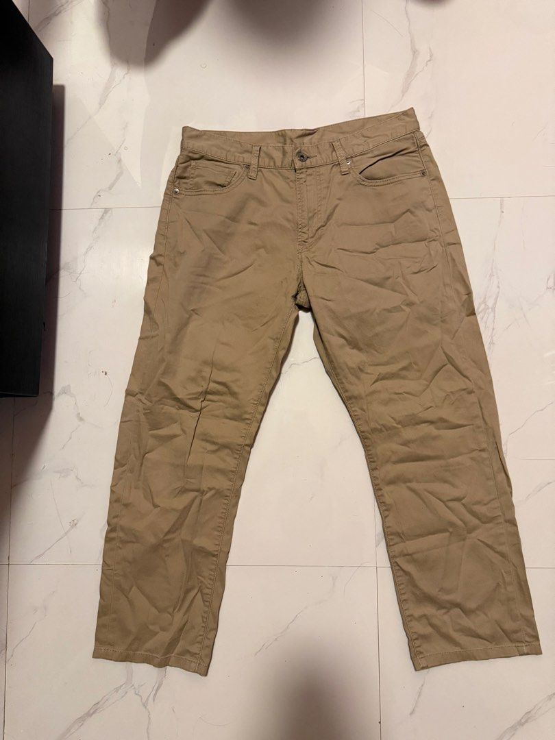 Uniqlo Khaki Trousers (Category: Trousers) located in Bacoor. Submitted by wise_dominic (Listing ID 1451986979, Image 1). Description: .