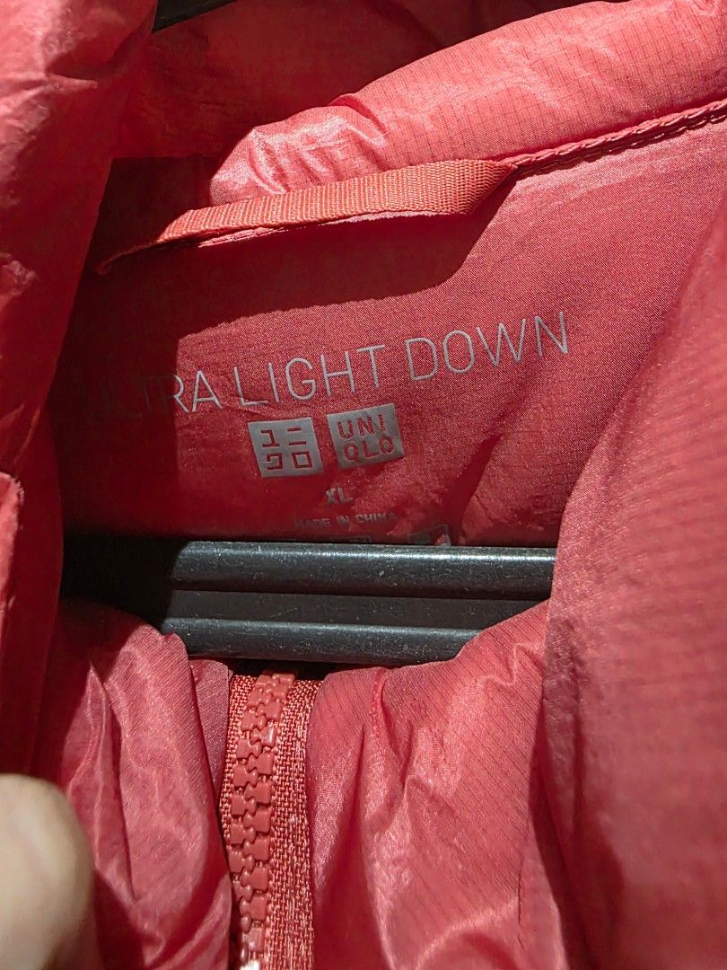 Uniqlo ultra light down parka orange (Category: Coats, Jackets and Outerwear) located in Muntinlupa City. Submitted by topperware (Listing ID 1452079939, Image 2). Description: Premium down is warm and lightweight. Made from highly durable ripstop. - Made with ultrafine thread for incredible lightness. - Warm premium down with a fill power of 750*. *Measured by the IDFB method - Specially constructed without down packing for an ultra light weight