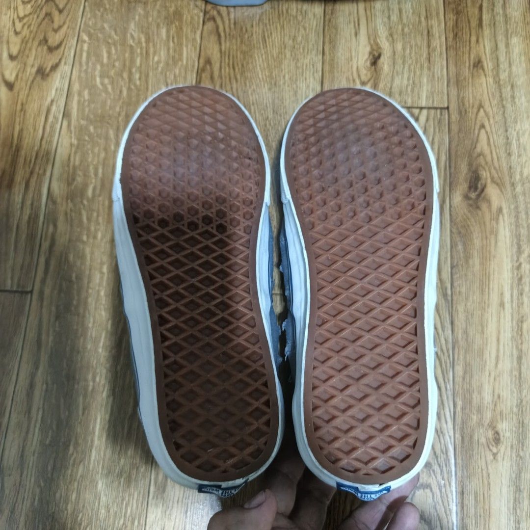 Vans Era Grey Distressed Canvas Skate Shoes (Category: Sneakers) located in Manila. Submitted by narju1234 (Listing ID 1452044192, Image 3). Description: - Grey Vans Era skate shoes - Distressed, ripped canvas material - Classic white rubber sole with blue stripe detail - Lace-up closure - Soles show wear but have plenty of grip - Perfect for everyday wear or skating size 9 and 10 available.