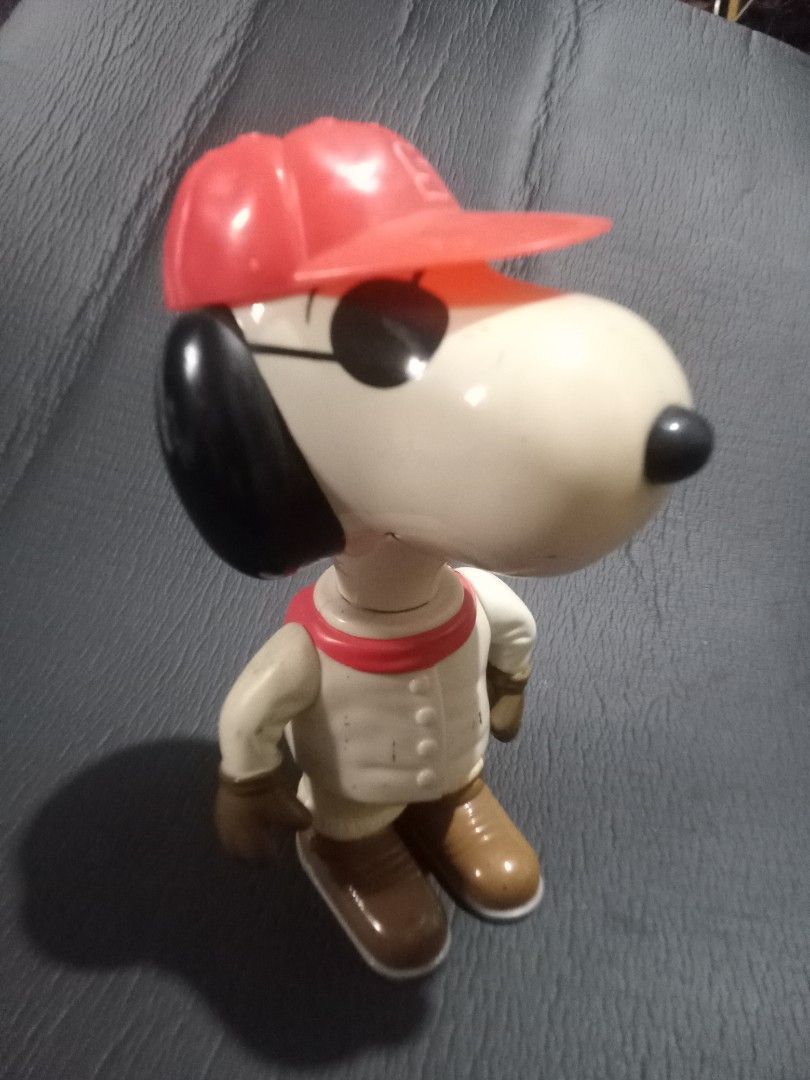 Vintage Snoopy Baseball Player Toy Figure (Category: Figurines & Statues) located in Makati City. Submitted by pardsroman (Listing ID 1451921008, Image 1). Description: - Adorable Snoopy toy dressed as a baseball player. - Features a red cap and a baseball uniform. - Comes in a playful, dynamic pose. - Ideal for Snoopy collectors and fans. - A fun and charming display piece..