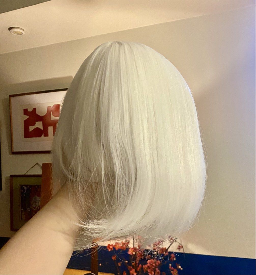 White Bob Wig with Bangs (Category: Hair Accessories) located in Mandaluyong City. Submitted by prebyh (Listing ID 1452080863, Image 3). Description: - White wig with bangs 👩🏻‍🦳 - High quality & not shiny! (doesn’t look fake compared to other cheap wigs) - 40cm, shoulder-length, good base to style - Ideal for costumes, cosplay, parties, pics! - Comes in original packaging 📦 bought this only last July 25. Used once for a party (literally an ho
