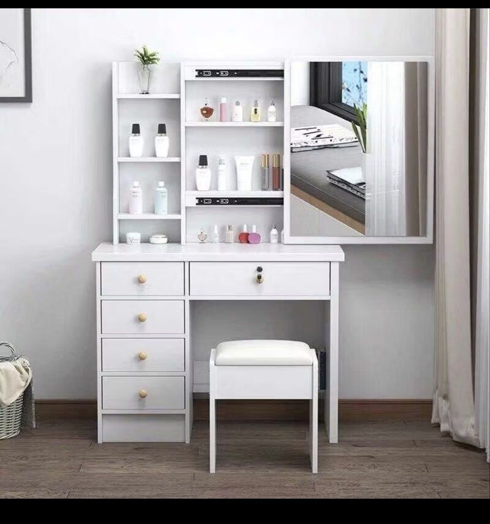 White Vanity Table with Mirror and Drawers (Category: Tables & Sets) located in Pasay City. Submitted by maxsell (Listing ID 1451916145, Image 2). Description: selling this from 3k to 2300 LP: 2000 Loc: Makati SIZE: 31 inch x 61 inch - White dressing table with a large mirror - Multiple shelves for storage - Top drawer with lock and key - NO CHAIR INCLUDED.