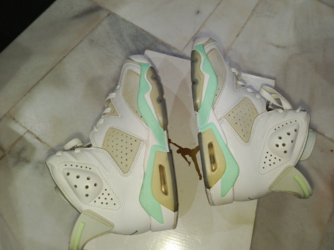 WMNS Air Jordan 6 Retro White Platinum Mint Foam (Category: Sneakers) located in Kuala Lumpur. Submitted by winlike82 (Listing ID 1452058738, Image 3). Description: Selling a pair of WMNS Air Jordan 6 Retro. Colorway is White/Pure Platinum-Mint Foam. Size is US 5 / UK 2.5 / EU 35.5. Comes with original box..