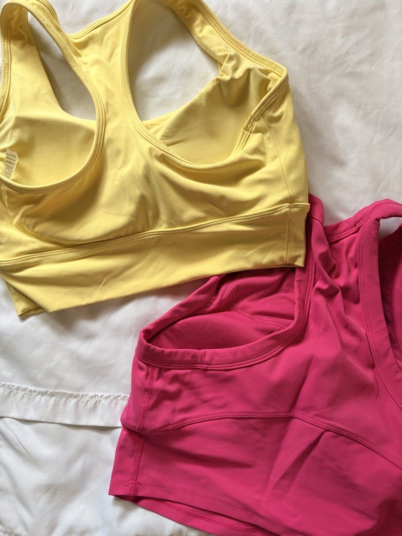 Yellow & Pink Sports Bras Bundle (Category: Activewear) located in Santa Rosa. Submitted by bluemingbh (Listing ID 1451961853, Image 2). Description: - Bundle of 2 sports bras for ₱450 - bought from 🍊 - size Large mop: gcash, bdo, maribank mod: j&t, sdd (makati or laguna) .