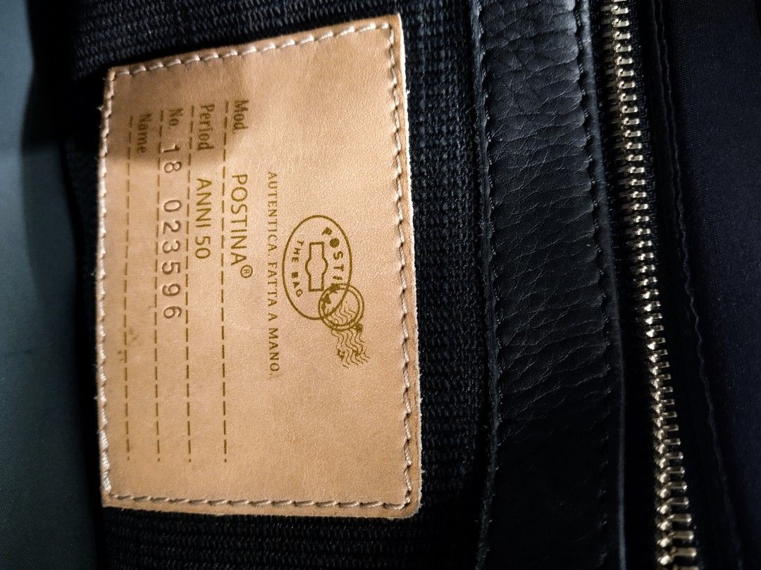 Zanellato Postina bag (Category: Luxury Bags & Wallets) located in Baguio. Submitted by is.titik_lux (Listing ID 1451937025, Image 3). Description: Brand: Zanellato Model: Postina (Tokyo Rimboccata style) Material: Nylon body with leather handle and trim Color: Black Features: Single top handle, detachable/adjustable shoulder strap, flap top with double turn-lock silver hardware closures..