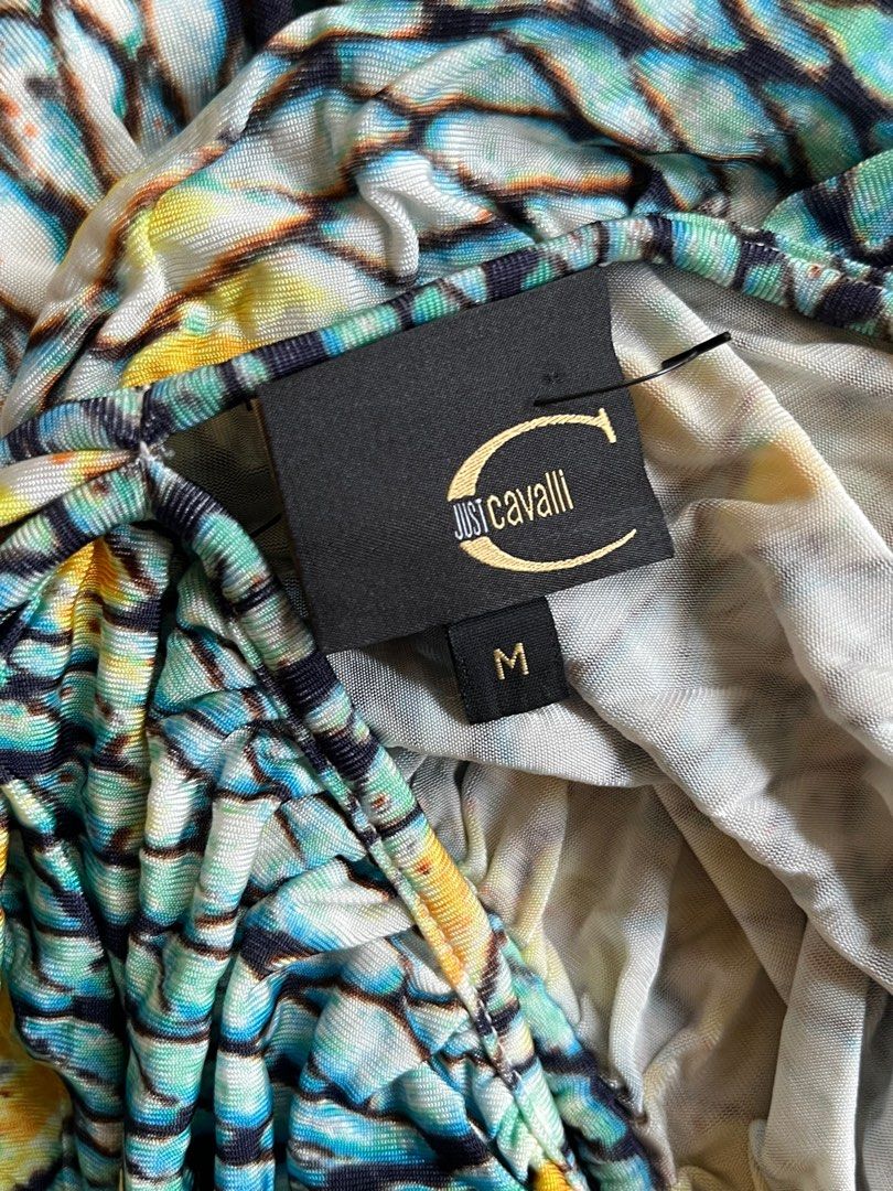 2000s Just Cavalli Reptile Print Ruched Top (Category: Shirts) located in Makati City. Submitted by slavetorave (Listing ID 1452122978, Image 3). Description: - Just Cavalli reptile print top - Size: Medium (M) - Features ruching down the front - V-neckline - Stretchy fabric .