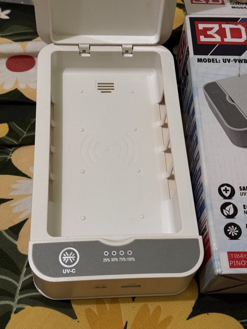 3D UV Wonder Box Sterilizer Model UV-9WB (Category: Breastfeeding & Bottle Feeding) located in Meycauayan. Submitted by jamclos.et (Listing ID 1452213833, Image 2). Description: - Kills 99.9% of germs and bacteria using UV light. - Disinfects phones, keys, masks, and other small items. - Chemical-free and safe disinfection process. - Functions as an aromatherapy diffuser. - Built-in mobile phone charger. - Fast 6-minute disinfection cycle. - USB 