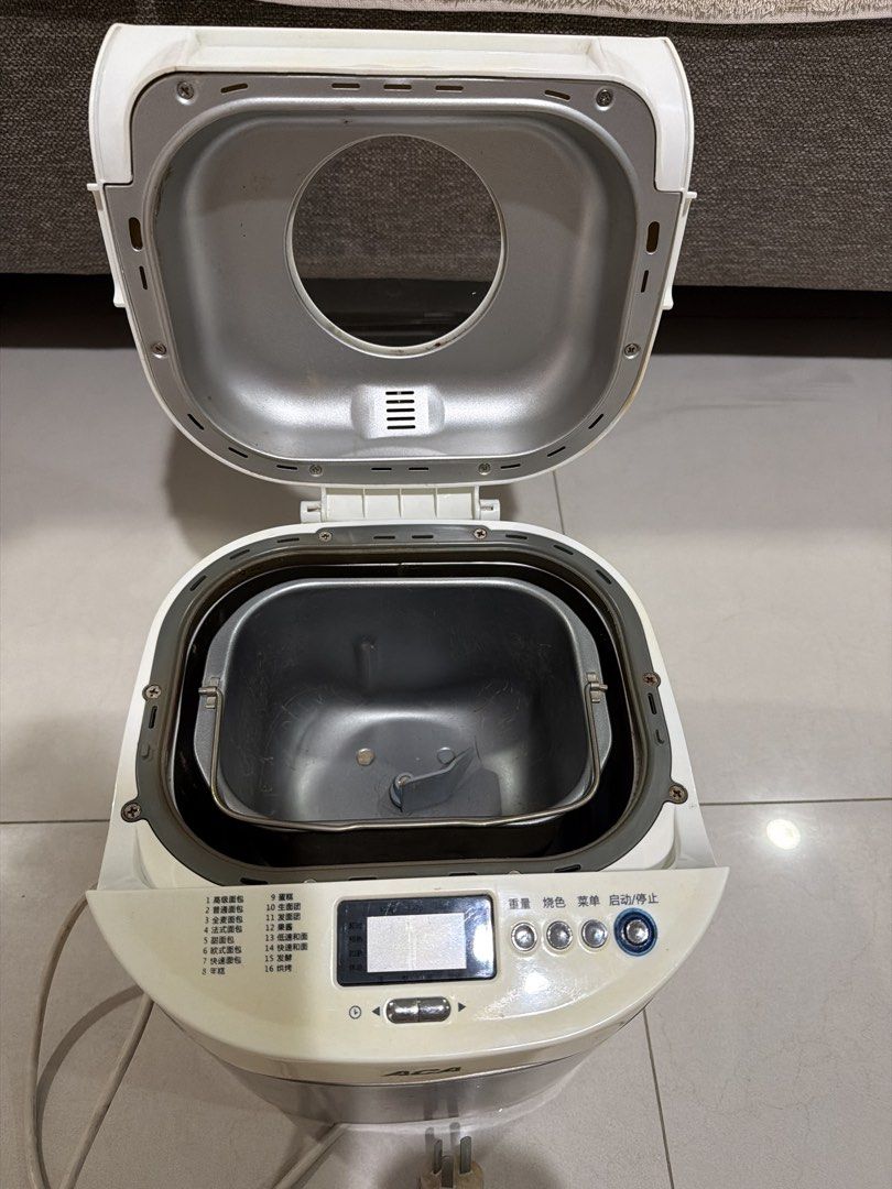 ACA Bread Maker Machine (Category: Breadmakers) located in Singapore. Submitted by walkingwithfortune (Listing ID 1452242958, Image 3). Description: - ACA Bread Maker - Stainless steel body - Multiple bread settings - Easy-to-use control panel with display - Perfect for delicious homemade bread -Still functional .