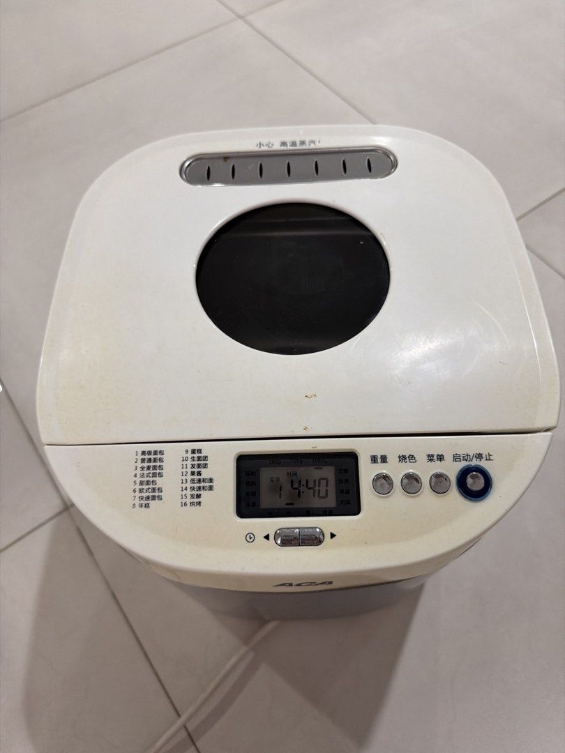 ACA Bread Maker Machine (Category: Breadmakers) located in Singapore. Submitted by walkingwithfortune (Listing ID 1452242958, Image 2). Description: - ACA Bread Maker - Stainless steel body - Multiple bread settings - Easy-to-use control panel with display - Perfect for delicious homemade bread -Still functional .