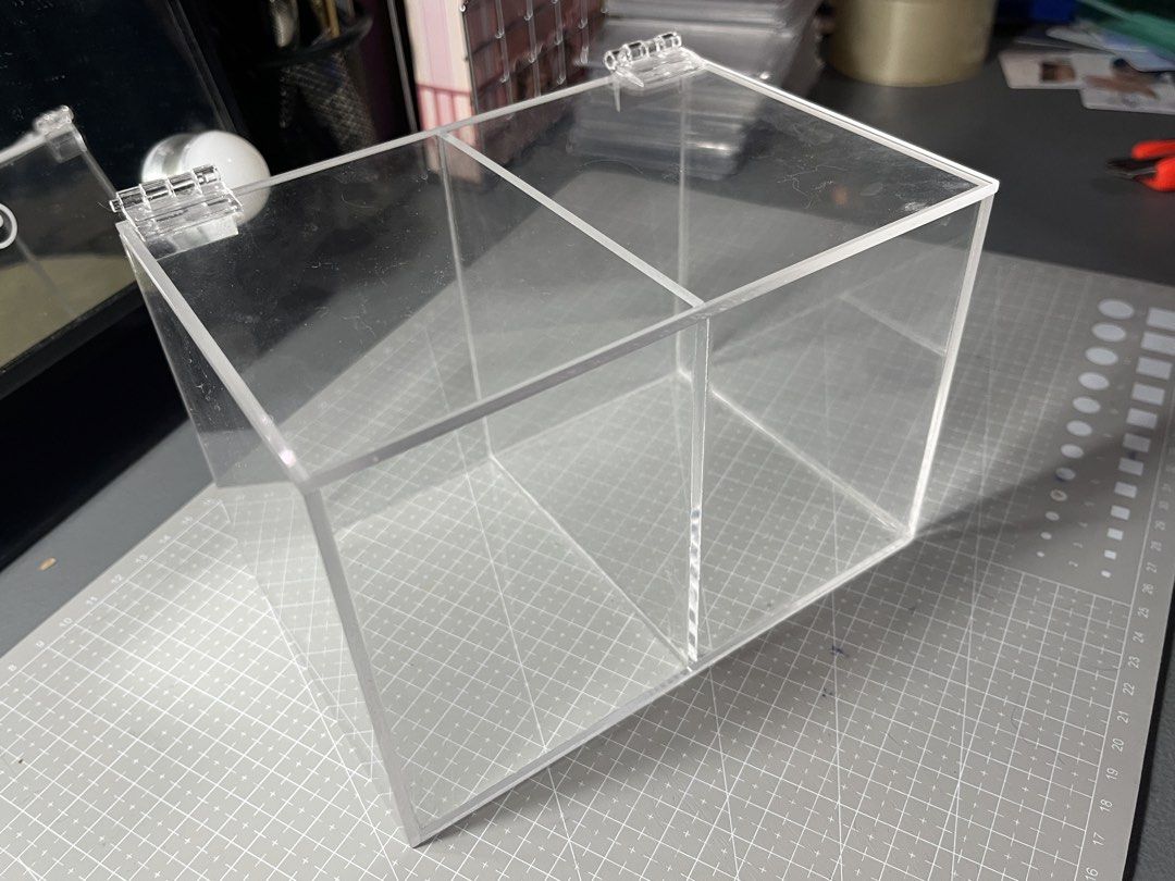 Acrylic Storage Box (Category: Storage Boxes & Baskets) located in Manila. Submitted by baejoocart (Listing ID 1452264764, Image 1). Description: - ₱600 / ₱500 if PAYO - size: 18x12x12cm / 2 slots - free pf - onhand - will give 30 slim toploaders as freebie~ mop: gcash, maribank mod: jnt rfs: decluttering.