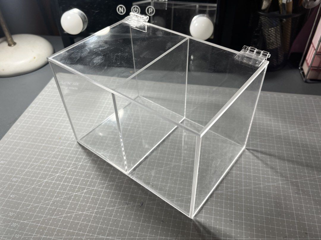 Acrylic Storage Box (Category: Storage Boxes & Baskets) located in Manila. Submitted by baejoocart (Listing ID 1452264764, Image 2). Description: - ₱600 / ₱500 if PAYO - size: 18x12x12cm / 2 slots - free pf - onhand - will give 30 slim toploaders as freebie~ mop: gcash, maribank mod: jnt rfs: decluttering.
