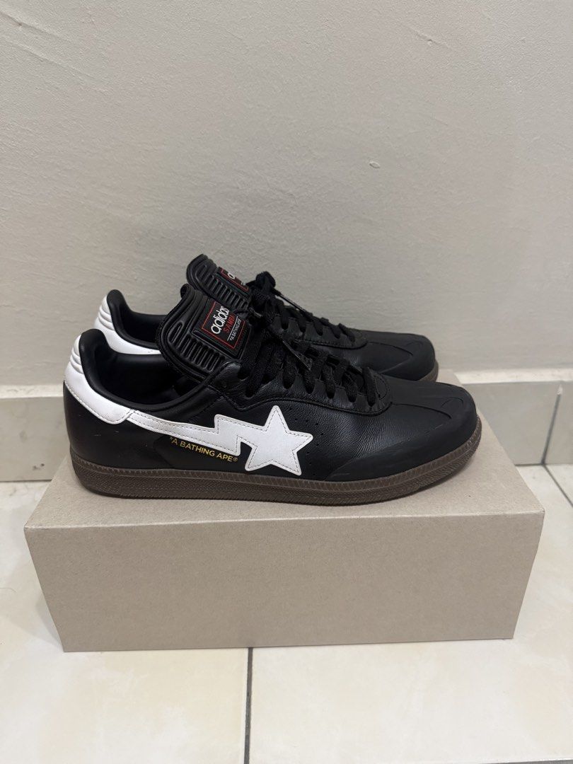 Adidas Samba BAPE Black White Star (Category: Sneakers) located in Shah Alam. Submitted by danixlrzp (Listing ID 1452245578, Image 3). Description: - Authentic Adidas Samba x BAPE collaboration sneakers. - Classic black leather upper with signature white stripes. - Features the iconic BAPE star logo. - Durable gum sole for excellent grip and style. - Comes complete with the original box. - Size: UK 8 / EU 42..