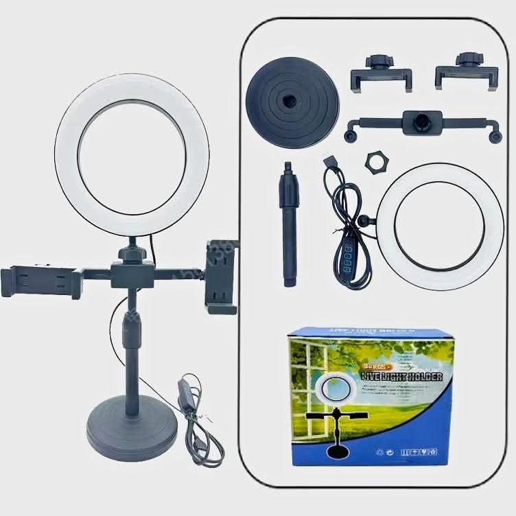 Adjustable Ring Light with Phone Holder for Live Streaming (Category: Lighting & Studio Equipment) located in Mandaue City. Submitted by marj-legitseller (Listing ID 1452223923, Image 1). Description: - 3 Color Temperature Modes: Whitening cold light, bright and soft skin tone, vintage warm light. - Stable Base: Ensures your setup stays put. - Multiple Phone Holders: Mount several devices at once. - Adjustable Height: Customize to your perfect an