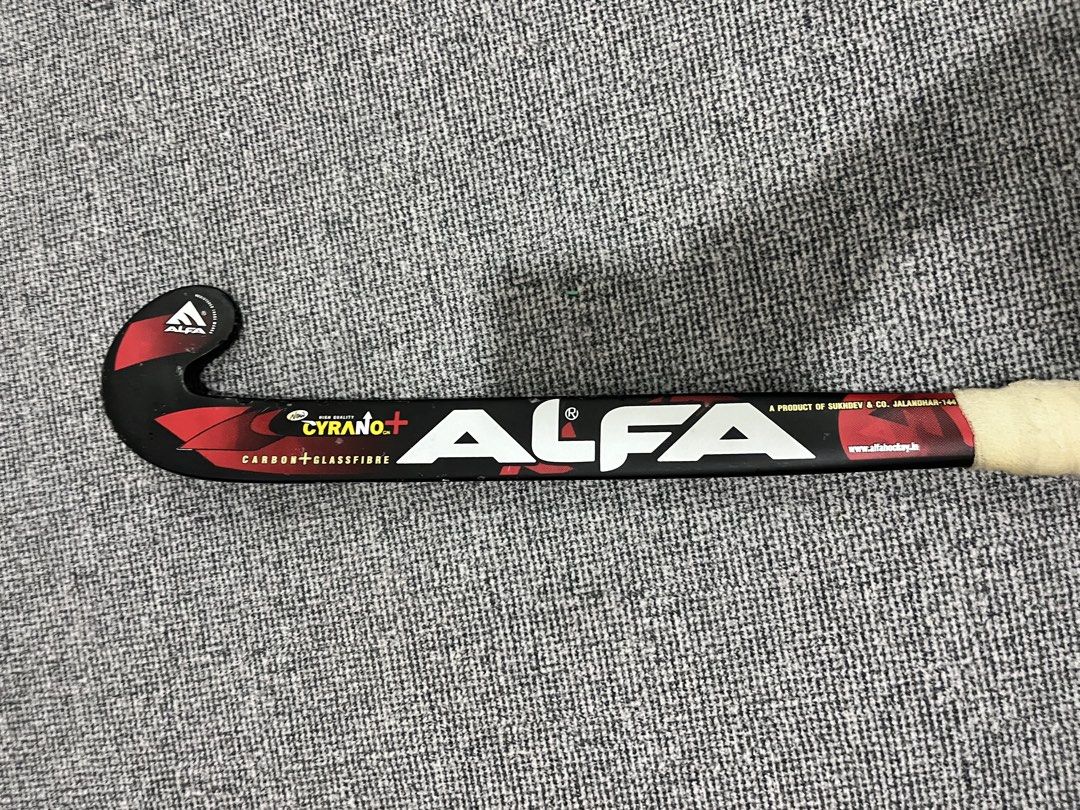 ALFA CYRANO+ Carbon Glassfibre Hockey Stick (Category: Other Sports Equipment and Supplies) located in Kuala Lumpur. Submitted by rayyanis (Listing ID 1452232097, Image 3). Description: - ALFA CYRANO+ hockey stick - Made with carbon and glassfibre - Stylish black and red design - Features grip tape for enhanced control - Perfect for playing hockey - Ready to hit the field! COD AREA IPOH bole nego.