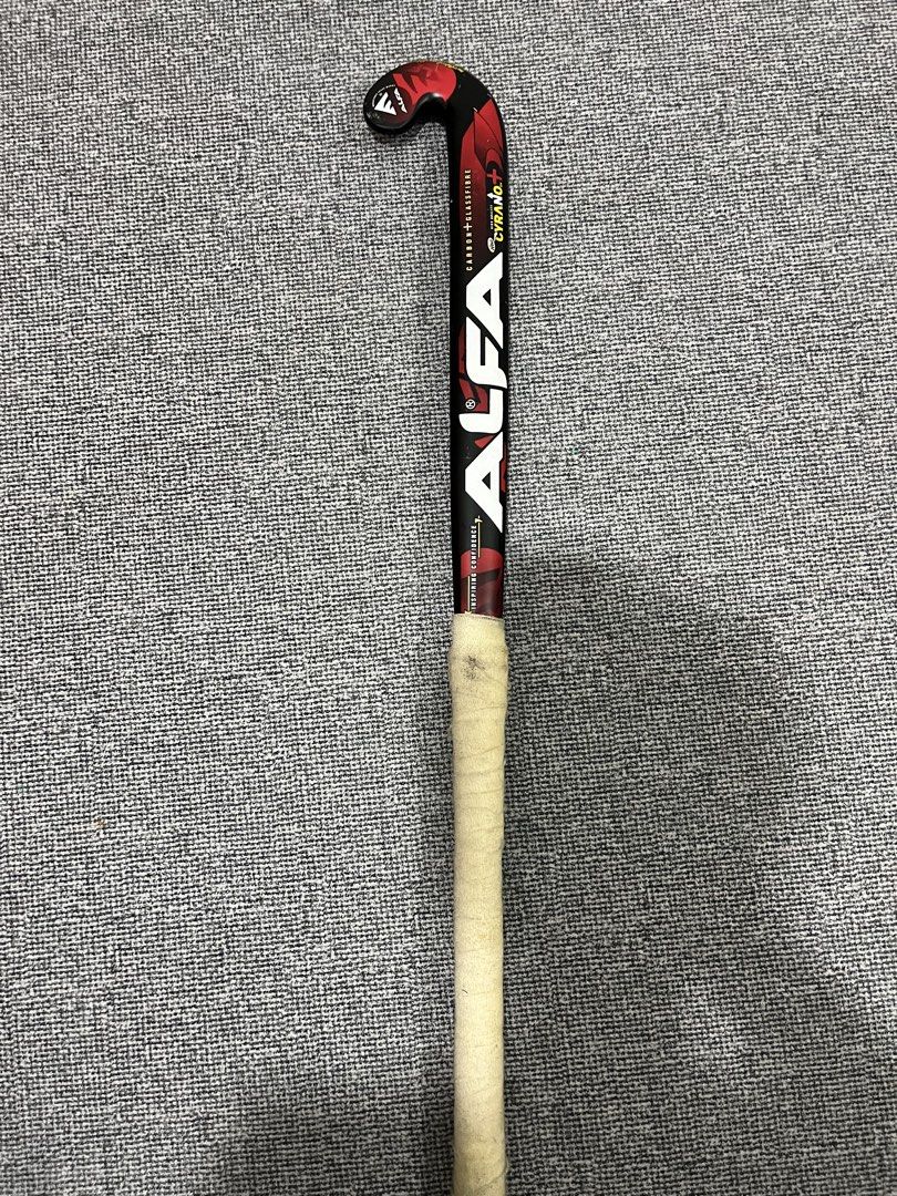 ALFA CYRANO+ Carbon Glassfibre Hockey Stick (Category: Other Sports Equipment and Supplies) located in Kuala Lumpur. Submitted by rayyanis (Listing ID 1452232097, Image 1). Description: - ALFA CYRANO+ hockey stick - Made with carbon and glassfibre - Stylish black and red design - Features grip tape for enhanced control - Perfect for playing hockey - Ready to hit the field! COD AREA IPOH bole nego.