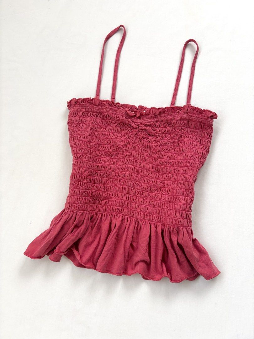 American Eagle warm pink smocked peplum cami top (Category: Sleeveless) located in Pateros City. Submitted by threadedtogether (Listing ID 1452316921, Image 3). Description: best fits: xxs-xs ✿ xs on tag ✿ 100% cotton [mannequin size s-m | b34” | w26” | h34” ] 💌 dm for questions and additional measurements 📦 J&T or SDD ⭐ first to pay basis.