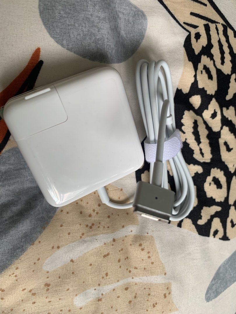 Apple MacBook T Type MagSafe 2 45W Charger (Category: Chargers) located in San Juan City. Submitted by ph_gadgets_hub (Listing ID 1452105580, Image 2). Description: MacBook Air / MacBook Pro charger. The MacBook MagSafe 2 Adapter (T tip) efficiently charges at home, in the office, or on the go. It’s a compatible MacBook charger. SALE‼️ WE ARE STILL ON SALE ❗️❗️❗️ ₱1,000 45W MagSafe 2 MacBook Charger (T-Type) Compatibility: MacBook Pro MacBook Air