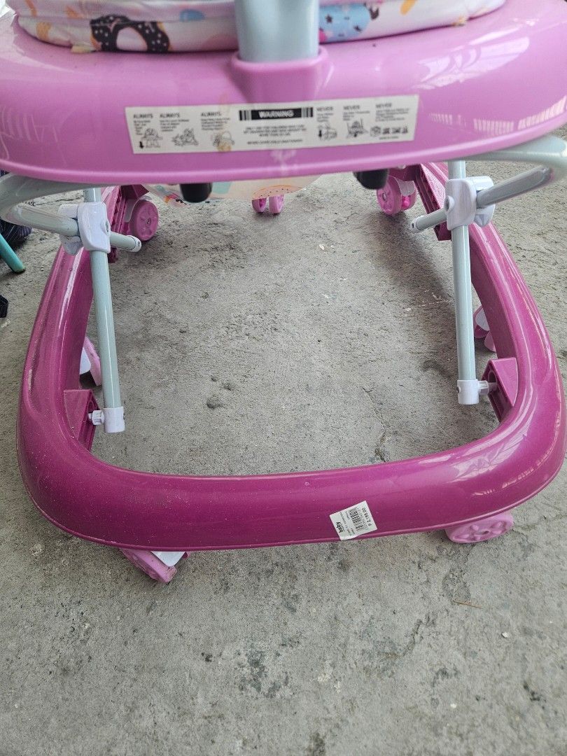 Apruva Baby Walker with Bear Toy (Category: Infant Playtime) located in Quezon City. Submitted by marco.luces23 (Listing ID 1452149272, Image 1). Description: Pink baby walker with a cute bear toy on the front. Bought last december for 2199php in baby company. Has a padded seat and a push handle. Wheels are intact. Some scuff marks on the frame. Ready for a new little walker! issues: needs cleaning and wala na yung accessory toy. wala na din yung