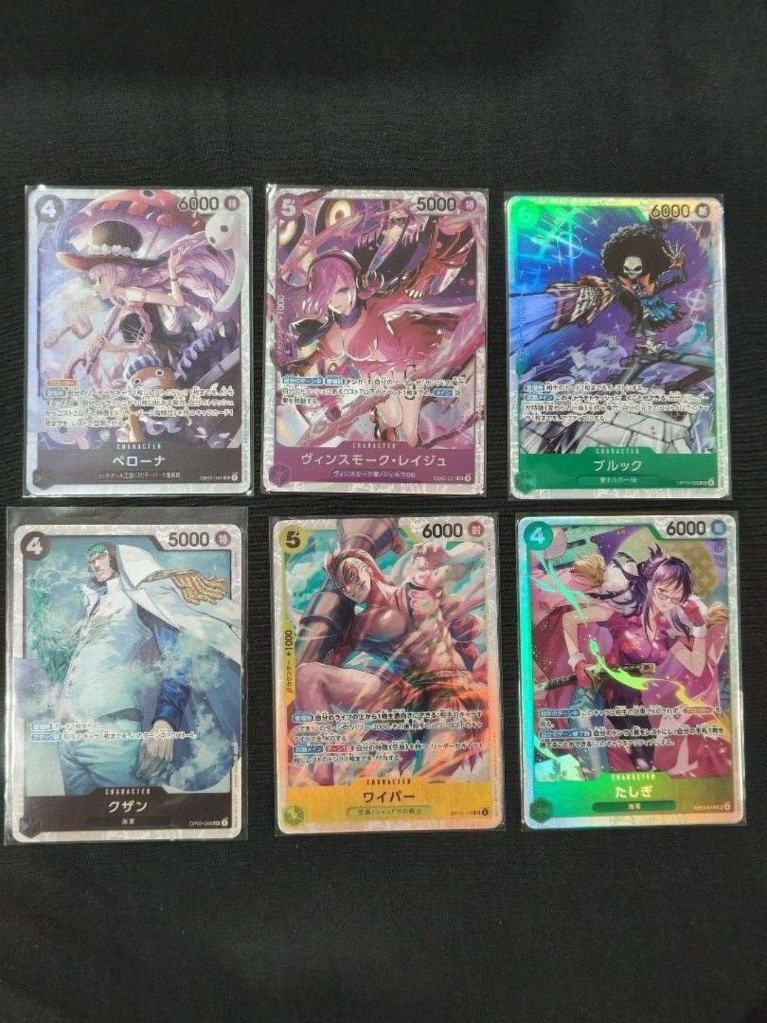 Assorted characters SR (Category: Raw Cards) located in Singapore. Submitted by zephie19 (Listing ID 1452296721, Image 1). Description: Assorted One Piece TCG SR for sale Can buy all for $6.