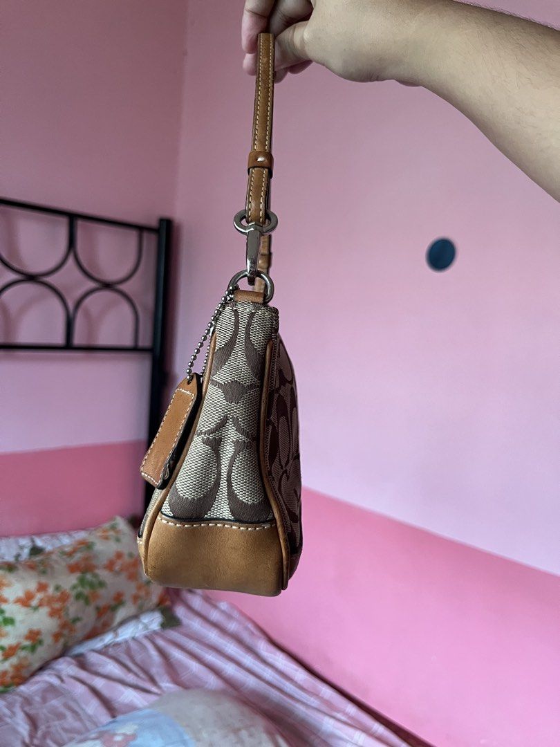 Authentic Coach Demi Shoulder Bag (Category: Shoulder Bags) located in Bongabon. Submitted by daniii.v (Listing ID 1452189134, Image 3). Description: Firm - replace zipper puller (leather) - minimal cracks on leather (side and handle) - no rubs and holes.