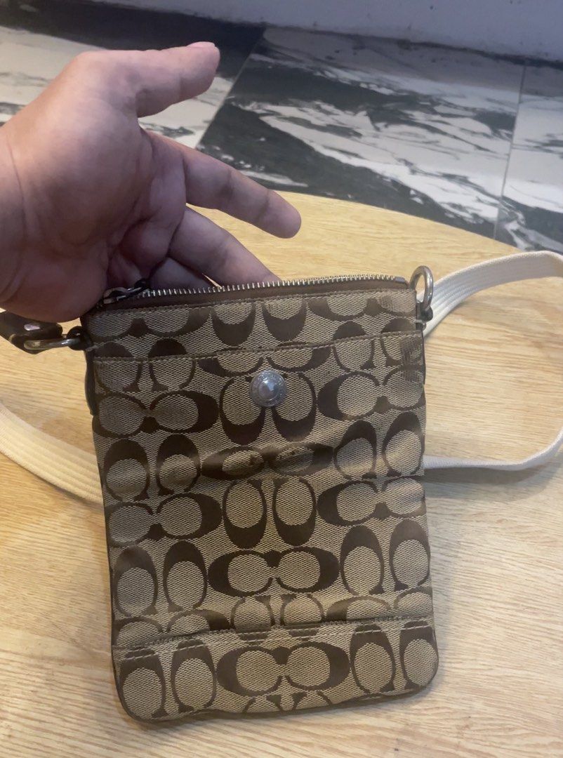Authentic coach sling (Category: Luxury Bags & Wallets) located in Cavite. Submitted by ohmie23 (Listing ID 1452292924, Image 1). Description: Authentic givenchy sling vintage.