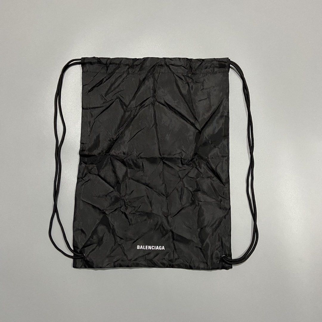 Balenciaga Nylon Drawstring Bag (Category: Backpacks) located in Cebu City. Submitted by johngregmoldez03 (Listing ID 1452196251, Image 1). Description: Balenciaga Nylon Drawstring Bag Dimension: 14 Width / 19 Length Color Rate: 10/10 Good As New No Issue Pm📩.