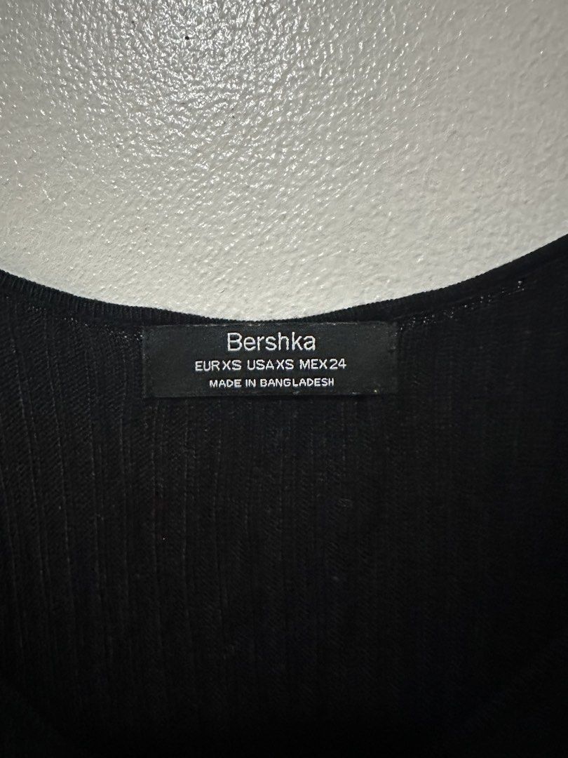 Bershka Black Spaghetti Strap Mini Dress (Category: Dresses) located in Manila. Submitted by lga05 (Listing ID 1452159634, Image 3). Description: - Black mini dress from Bershka - Spaghetti straps - Ribbed texture - Estimated size XS but can fit size S - Perfect wardrobe basic, can be dressed up or down.