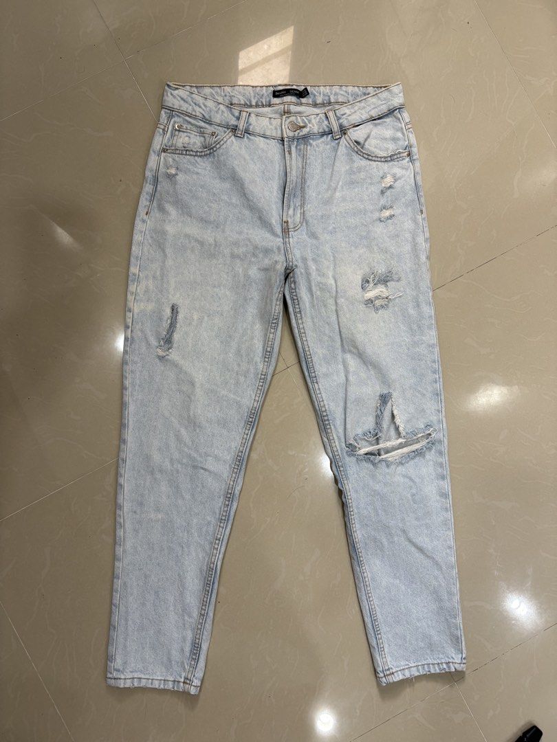 BERSHKA RIPPED LIGHT DENIM JEANS (Category: Jeans) located in Cebu City. Submitted by izzaa.lifestyle (Listing ID 1452192370, Image 2). Description: Condition: 9/10 Color Rate: 9/10 Dimensions: 30-32”W x 39”L Issues: ❌ *1ST PIC FOR REFERENCE*1ST PIC FOR REFERENCE.
