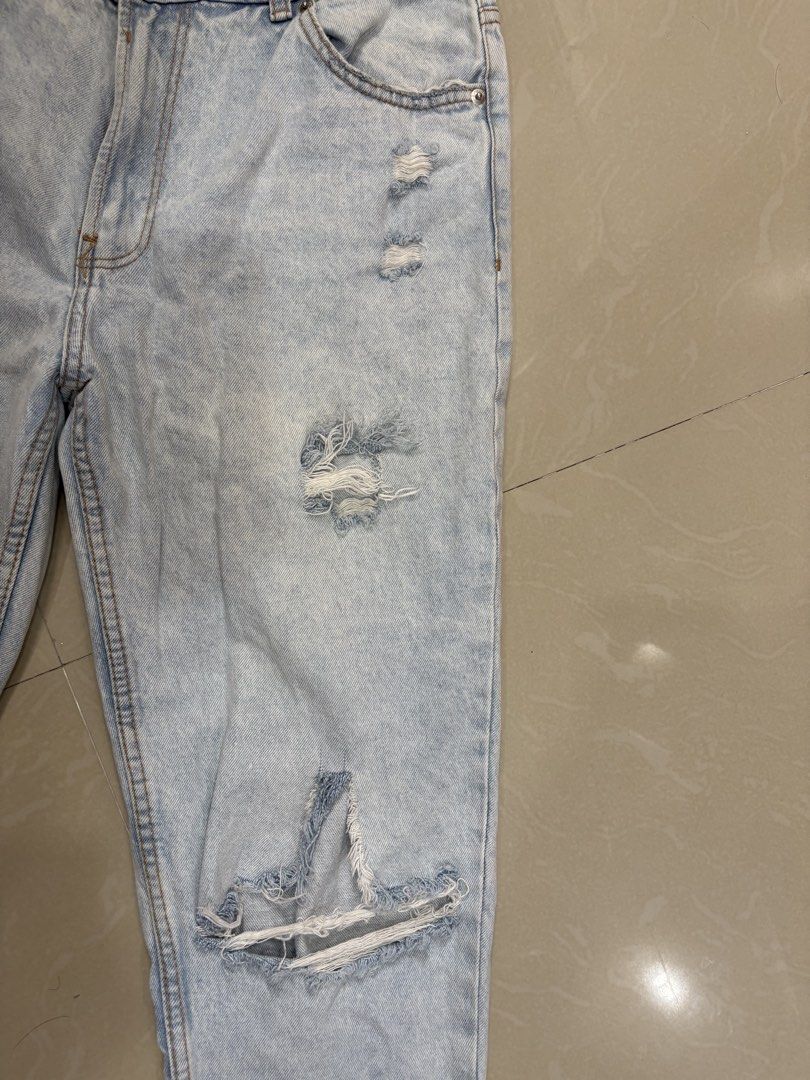 BERSHKA RIPPED LIGHT DENIM JEANS (Category: Jeans) located in Cebu City. Submitted by izzaa.lifestyle (Listing ID 1452192370, Image 3). Description: Condition: 9/10 Color Rate: 9/10 Dimensions: 30-32”W x 39”L Issues: ❌ *1ST PIC FOR REFERENCE*1ST PIC FOR REFERENCE.