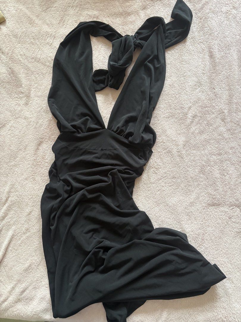 Black Halter Neck Ruched Maxi Dress (Category: Dresses) located in Tarlac. Submitted by wekewl (Listing ID 1452176597, Image 1). Description: - Flowy black maxi dress - Deep V-neckline with halter neck tie - Ruched detailing at the waist - Beautifully draping fabric - Ideal for a night out or special occasion.