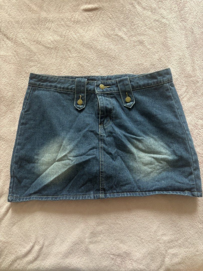 Blue Denim Mini Skirt with Shorts Underlay (Category: Skirts) located in Tarlac. Submitted by wekewl (Listing ID 1452176243, Image 1). Description: - Cute blue denim mini skirt - Built-in shorts for extra coverage - Classic button and zip closure - Stylish faded wash effect - Ideal for casual outfits - Easy to pair with various tops.