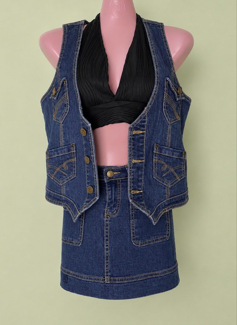 Blue Denim Vest and Mini Skirt Set (Category: Sets or Coordinates) located in Las Pinas. Submitted by jewicka (Listing ID 1452218603, Image 1). Description: - Di talaga siya set pero bagay siya as set, can be sold separately. -Free nalang yung inner if set bibilhin.🫶🏻 - Skort bottoms. - Cute blue denim vest and matching mini skirt set. - Vest features button closures and pocket details. - Skirt is a classic A-line style with button and zip clos