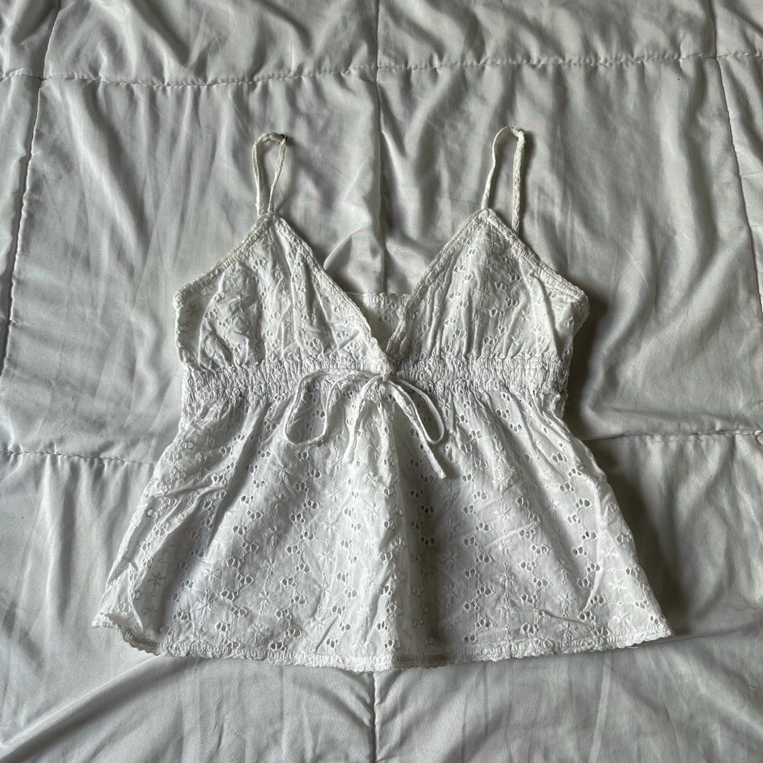 Brandy Melville Edith Embroidered Floral Top (Category: Others Tops) located in Davao. Submitted by byeooool (Listing ID 1452226166, Image 1). Description: - has john galt tag - no flaws at all. best fits xs-semi med - adjustable straps - no lowballing. would rather keep than sell lower.