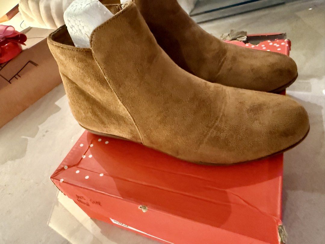 Brown Suede Ankle Boots with Side Zip (Category: Boots) located in Quezon City. Submitted by saturdayfindsstudio (Listing ID 1450007051, Image 3). Description: S&H ankle boots in a beautiful camel/tan color. Worn only twice for an event, so they’re still in excellent condition with minimal signs of use. Details: * Brand: S&H * Size: 36 * Color: Camel/Tan * Soft suede-like material * Side zipper closure * Comfortable flat sole * Stylish and versat