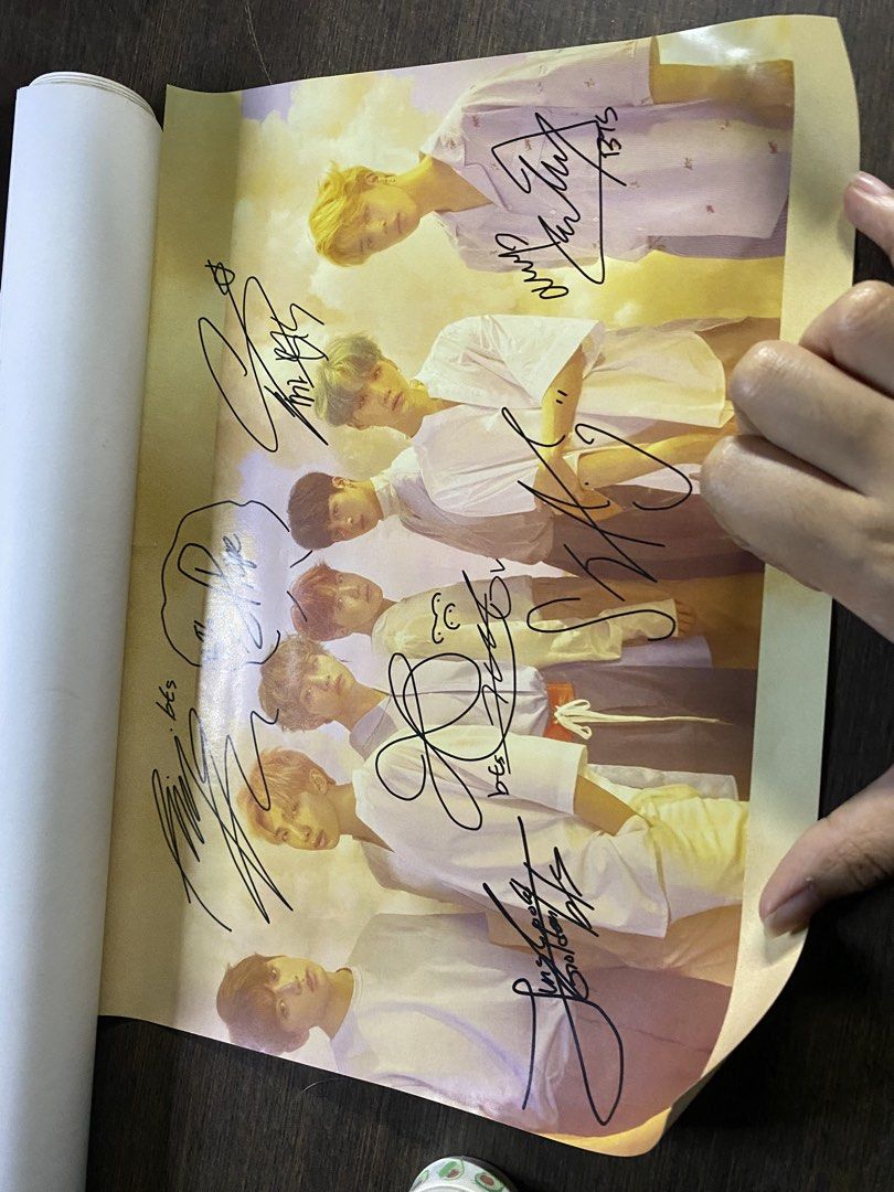 BTS Signed Poster - Official Merchandise (Category: K-Wave Merchandise) located in Quezon City. Submitted by drei13_sniffles (Listing ID 1452146228, Image 3). Description: - Authentic BTS poster with signatures from all members. - Large size, perfect for framing or wall display. - Features the group in their iconic outfits. - printed Signatures are clear and legible, not signed by markers - A must-have for any ARMY and K-pop collector. - rfs: dow