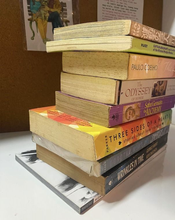 Bundle of Assorted Books Take All for P500 (Category: Storybooks) located in Paranaque City. Submitted by thematerialworld (Listing ID 1452202309, Image 2). Description: Bundle of 7 books: - Homer's Odyssey - The Zahir by Paulo Coelho - Saint Germain Alchemy - Three Sides of a Heart - Dorothy Must Die, Wrinkles in Time, and - Trese Midnight. Condition: Some pages yellowed with age..