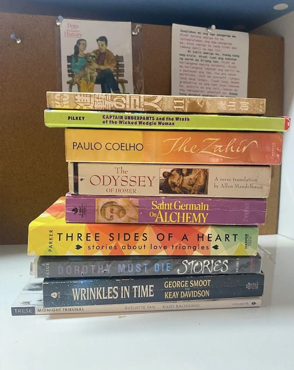 Bundle of Assorted Books Take All for P500 (Category: Storybooks) located in Paranaque City. Submitted by thematerialworld (Listing ID 1452202309, Image 1). Description: Bundle of 7 books: - Homer's Odyssey - The Zahir by Paulo Coelho - Saint Germain Alchemy - Three Sides of a Heart - Dorothy Must Die, Wrinkles in Time, and - Trese Midnight. Condition: Some pages yellowed with age..