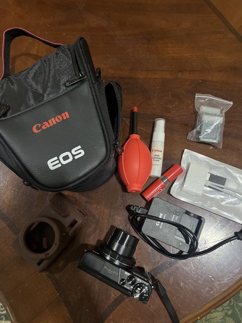 Camera Canon G7X Mark II (for repair/spare parts) (Category: Cameras) located in Kota Bharu. Submitted by hnfhh_ (Listing ID 1452246560, Image 2). Description: Condition: • Lens produces a clicking sound upon startup and is not functioning normally (suspected lens error). • may have internal water damage/corrosion • Sold as-is. No warranty or returns. The price includes everything in the picture, important:the camera is currently not working, sol