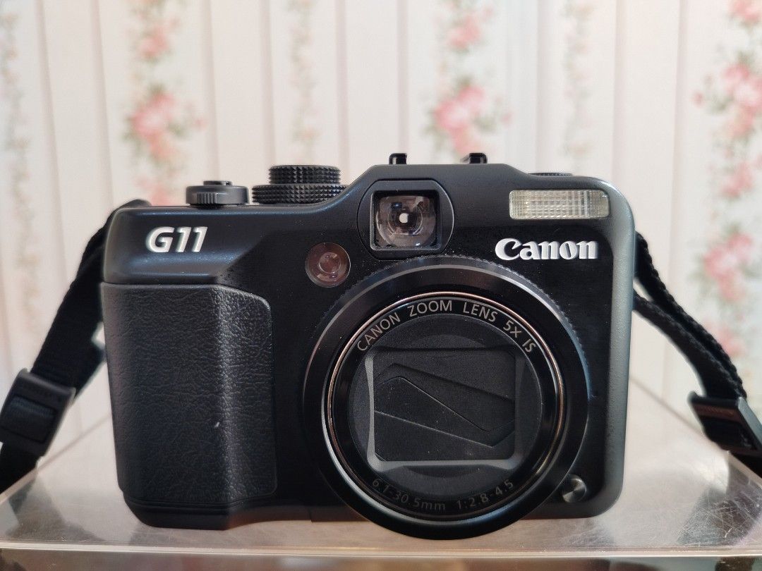 Canon PowerShot G11 (Category: Cameras) located in Kuala Lumpur. Submitted by de-vintage (Listing ID 1452121186, Image 1). Description: In perfect condition fully functioning well and tasted no problem lens ✅ flash ✅ LCD screen ✅ zoom ✅ body no scratches ✅ come with battery and SD card and charger.