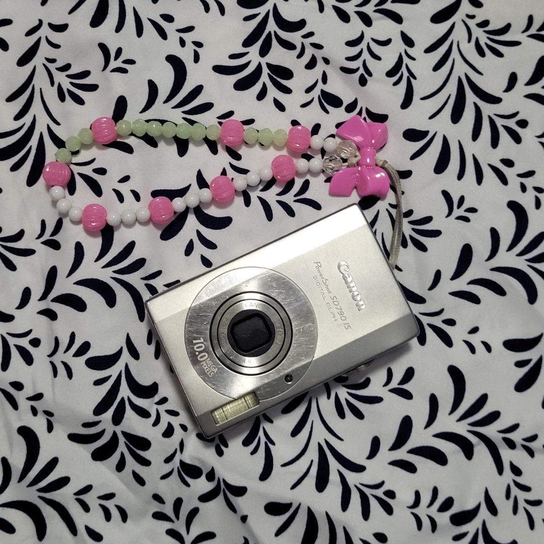CANON POWERSHOT SD790 IS - Digital Elph in Silver (Category: Cameras) located in Rosario. Submitted by lovedbysay (Listing ID 1452145782, Image 1). Description: CANON POWERSHOT SD790 IS - Digital Elph in Silver > Fully working > cosmetics: 7/10, signs of usage only > price is negotiable SPECS: • 10.0 Megapixel • 3x Optical Zoom (35 - 105mm equivalent) • 3.0" PureColor LCD Display • Optical Image Stabilizer • High Sensitivity (ISO 1600) • Face Det