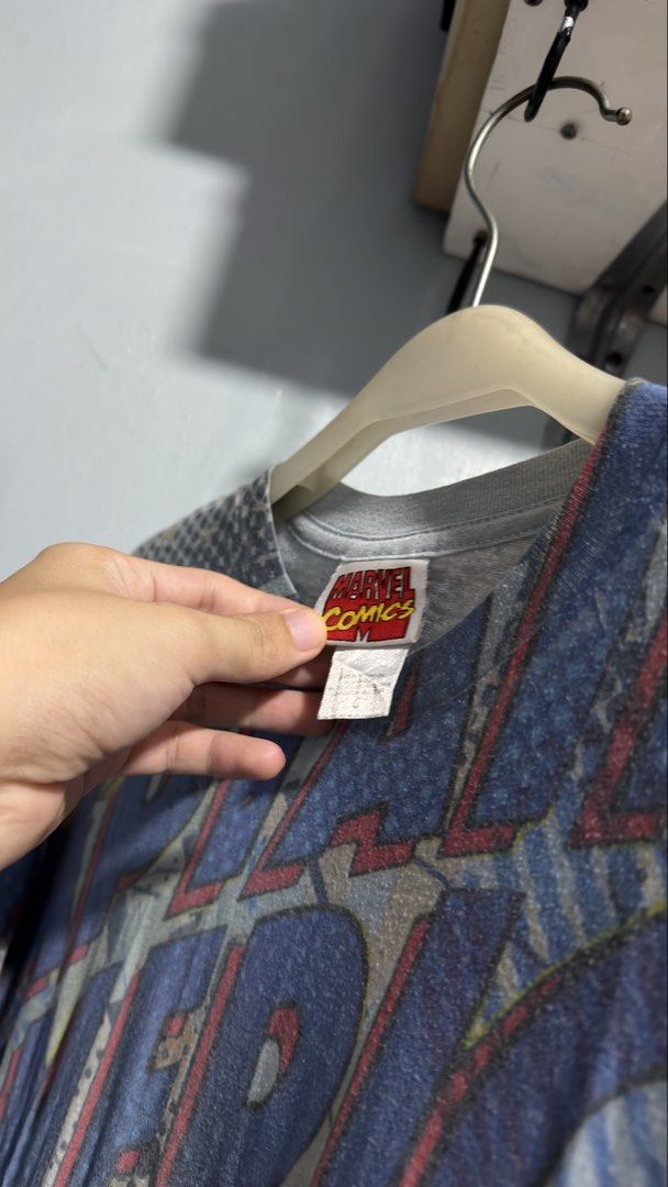 Captain America - AOP Shirt (Category: Tshirts & Polo Shirts ) located in Manila. Submitted by goodhumanbeing (Listing ID 1452312760, Image 3). Description: Marvel Captain America Shirt dated 2009 22x28.5 Graphic fading.