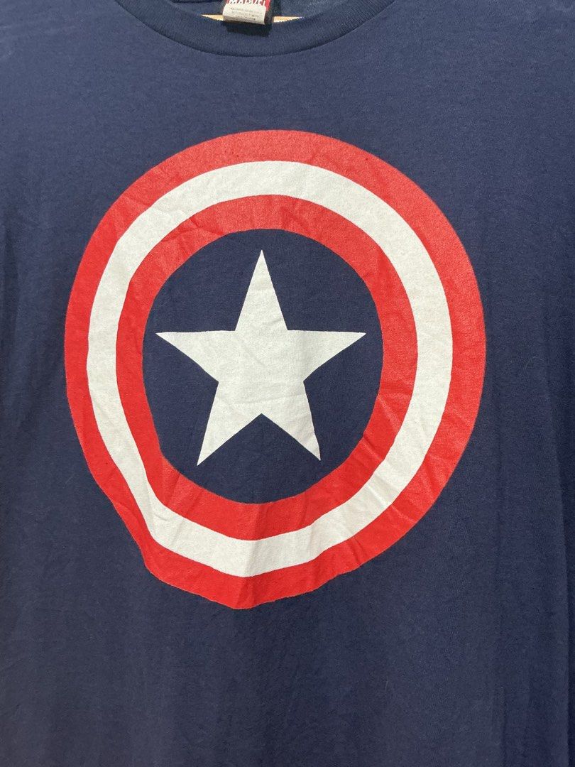 Captain America Mad Engine (Category: Tshirts & Polo Shirts ) located in Bulacan. Submitted by garmentsbyadi. (Listing ID 1452241730, Image 2). Description: - Captain America Shield Design - Hardtag Mad Engine 2012 Length: 30 Width: 23 23x30 - Large to XL Condition: 9.5 Color rate: 9.5 (Color may vary due to lighting).