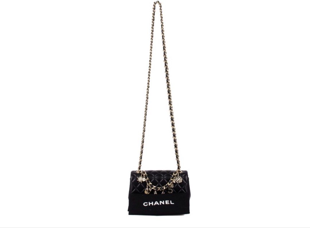 CHANEL Coco Charms Mini Rectangular Black Top Handle Bag (Category: Luxury Bags & Wallets) located in Taguig. Submitted by luxeinofficial (Listing ID 1452139656, Image 2). Description: CHANEL Coco Charms Mini Rectangular Black Top Handle Bag SKU: DRYZUE Gender: Ladies Material: Lambskin leather Stamp: 30972824 Year: 2020 Interior: One open pocket, one zip pocket and one main compartment Measurements: 7.9”L X 2.5”W X 4.75”H Handle Drop: 2.75” / 22