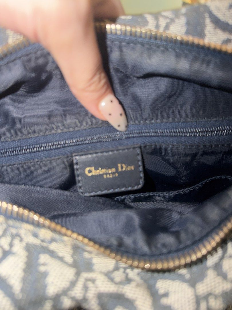 Christian Dior Monogram Boston Bag (Category: Luxury Bags & Wallets) located in Manila. Submitted by shlapdua_ (Listing ID 1452191777, Image 3). Description: - Authentic Christian Dior Boston Bag - Classic Dior Monogram Pattern - Genuine Leather Handles and Trim - Secure Zipper Closure - Interior Zip Pocket - Features Christian Dior Paris Label - Ideal for Everyday Use.