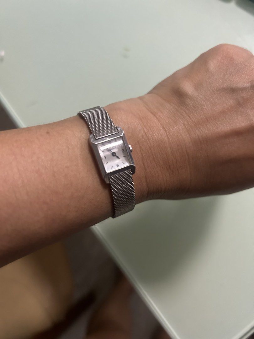 Citizen Stainless Steel Mesh Strap Watch (Category: Men's Watches) located in Cavite. Submitted by mamamia73 (Listing ID 1452206257, Image 3). Description: - Classic Citizen watch - Silver-tone stainless steel case - Matching adjustable mesh strap for a comfortable fit - Rectangular face with easy-to-read markers - Works well - Versatile for everyday wear or dressing up.