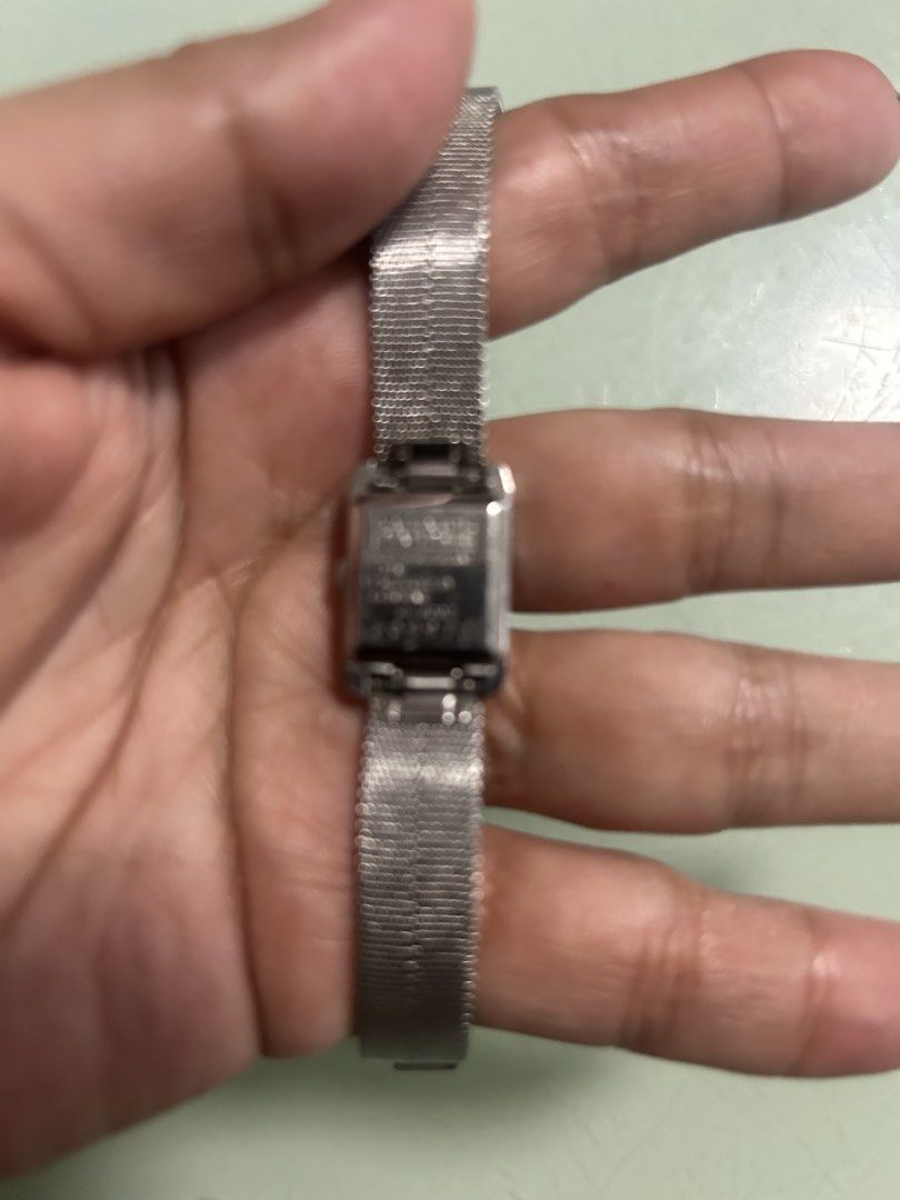 Citizen Stainless Steel Mesh Strap Watch (Category: Men's Watches) located in Cavite. Submitted by mamamia73 (Listing ID 1452206257, Image 2). Description: - Classic Citizen watch - Silver-tone stainless steel case - Matching adjustable mesh strap for a comfortable fit - Rectangular face with easy-to-read markers - Works well - Versatile for everyday wear or dressing up.
