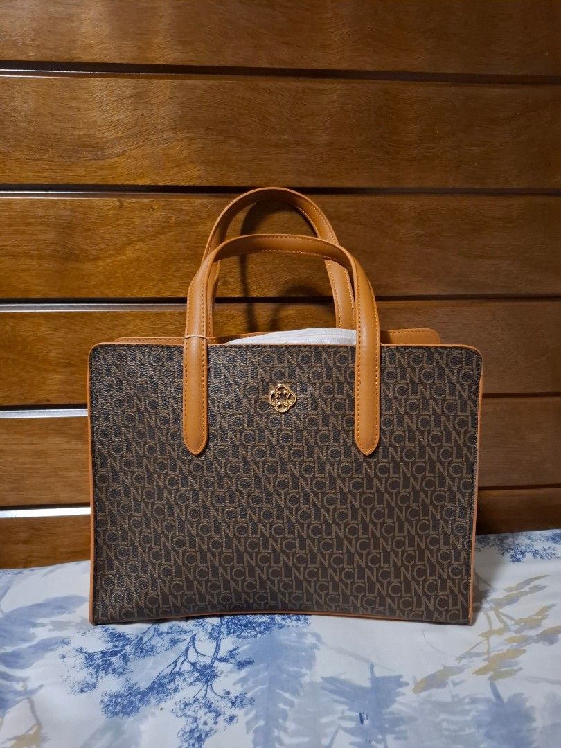 CLN BAG & SLING WALLET (Category: Luxury Bags & Wallets) located in Las Pinas. Submitted by lavinia.ph (Listing ID 1452257321, Image 1). Description: PAIR FOR ONLY P2,000 ALMOST NEW. GOOD NA GOOD PO. LOCATION: DOÑA MANUELA 1 LAS PIÑAS.