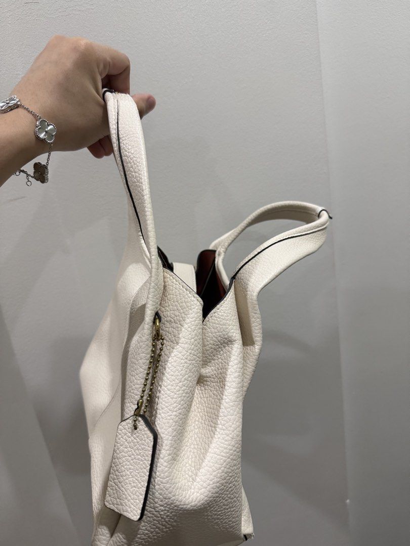 Coach Lana Shoulder Bag (Category: Luxury Bags & Wallets) located in Manila. Submitted by xxaaelir (Listing ID 1452144454, Image 2). Description: The handle has damage. With dustbag and plastic 📍Cavite.