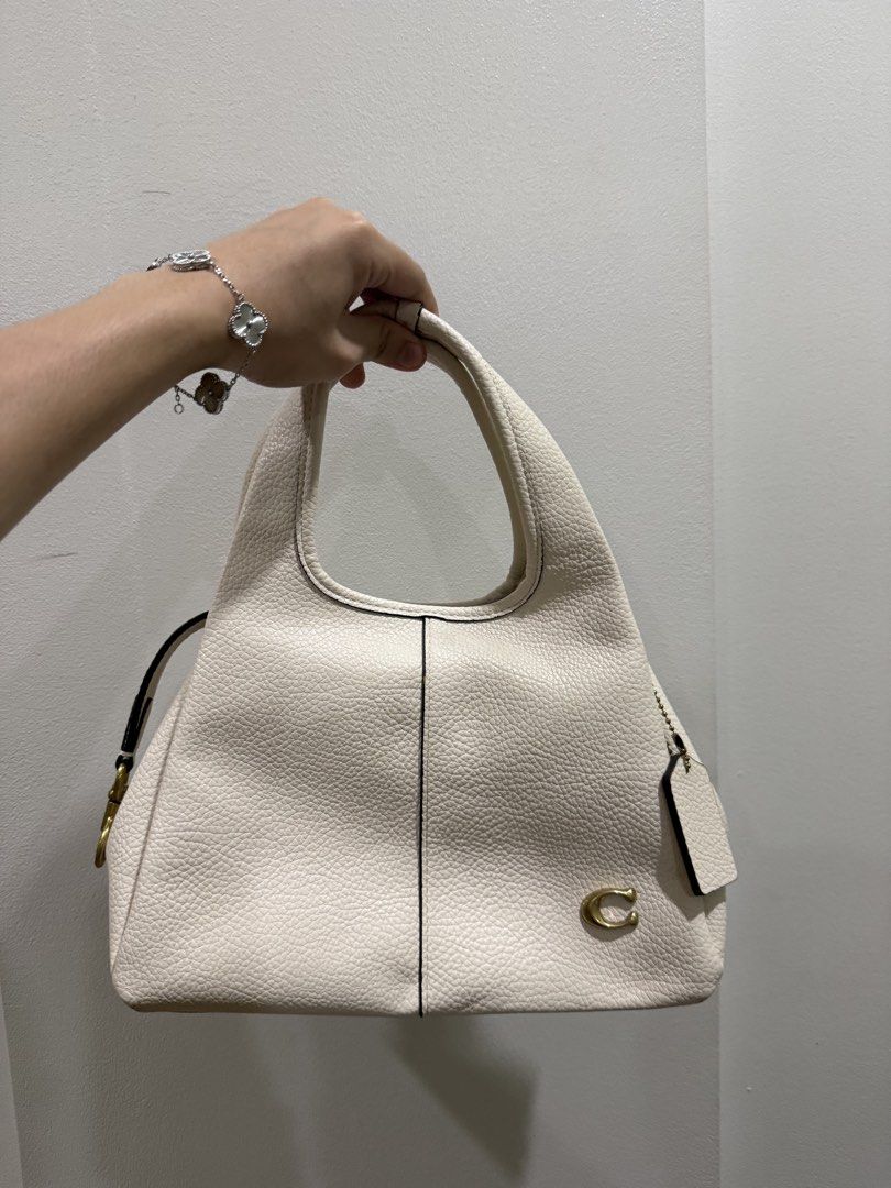 Coach Lana Shoulder Bag (Category: Luxury Bags & Wallets) located in Manila. Submitted by xxaaelir (Listing ID 1452144454, Image 1). Description: The handle has damage. With dustbag and plastic 📍Cavite.