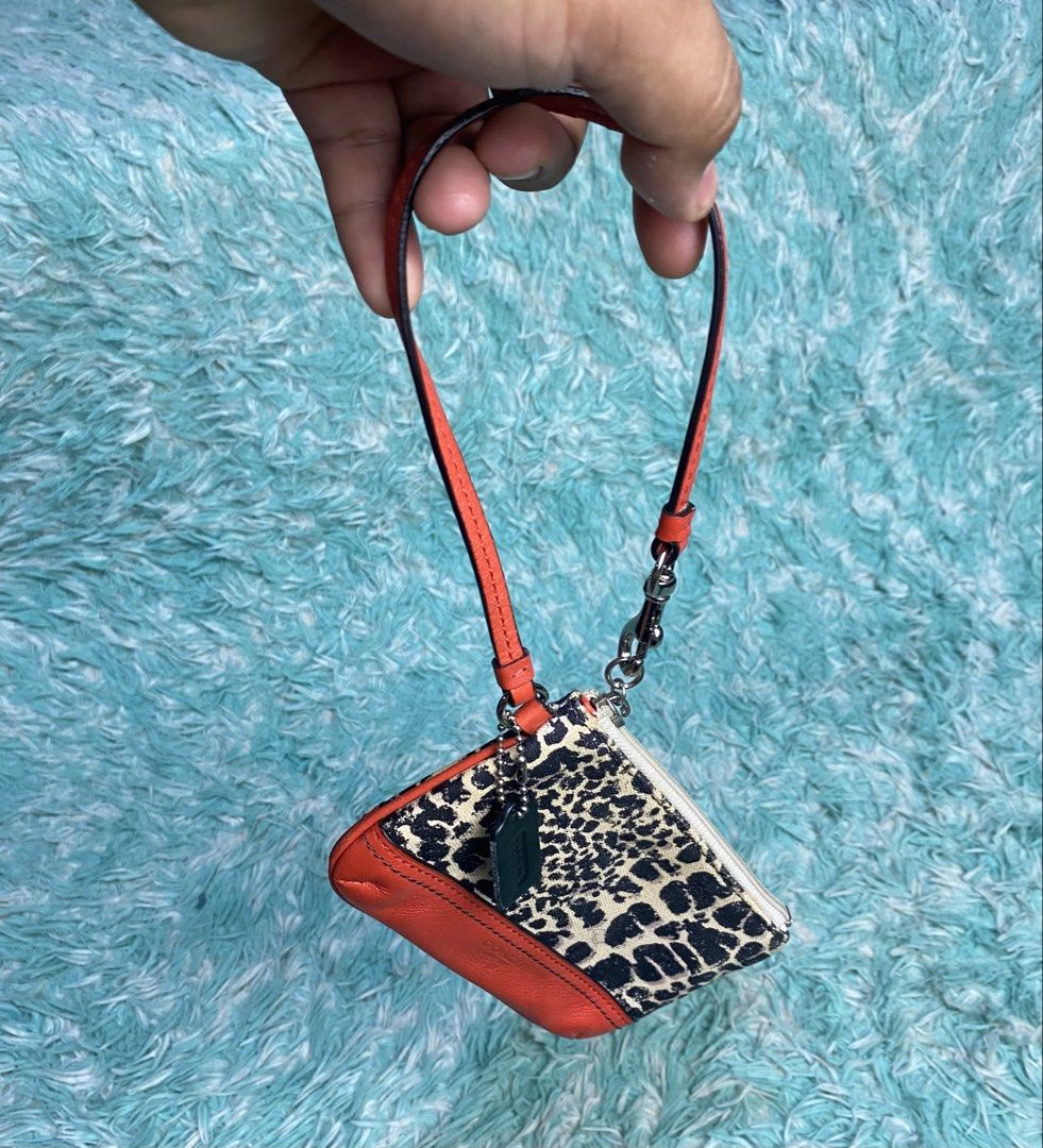 Coach Legacy Ocelet Cheetah Canvas Wristlet (Category: Luxury Bags & Wallets) located in Villaverde. Submitted by theluxurythrift.ph (Listing ID 1452274884, Image 3). Description: Wts Coach Legacy Ocelet Wristlet Rank AB Still in Excellent Condition Issue: Need Clean Inside only 1899 + Sf.